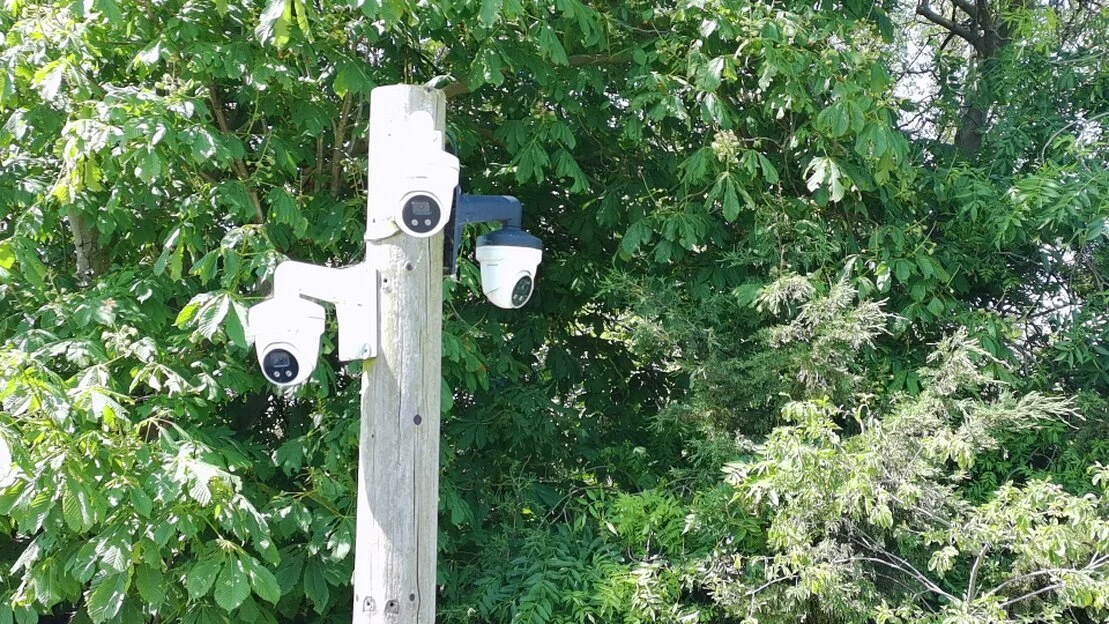 CCTV camera overlooking a secure industrial estate entrance