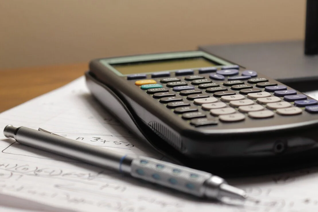 Business rates paperwork and calculator on a desk